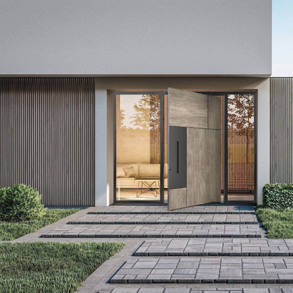 Pivot front door with wood-look finish and side glass panels in modern concrete home