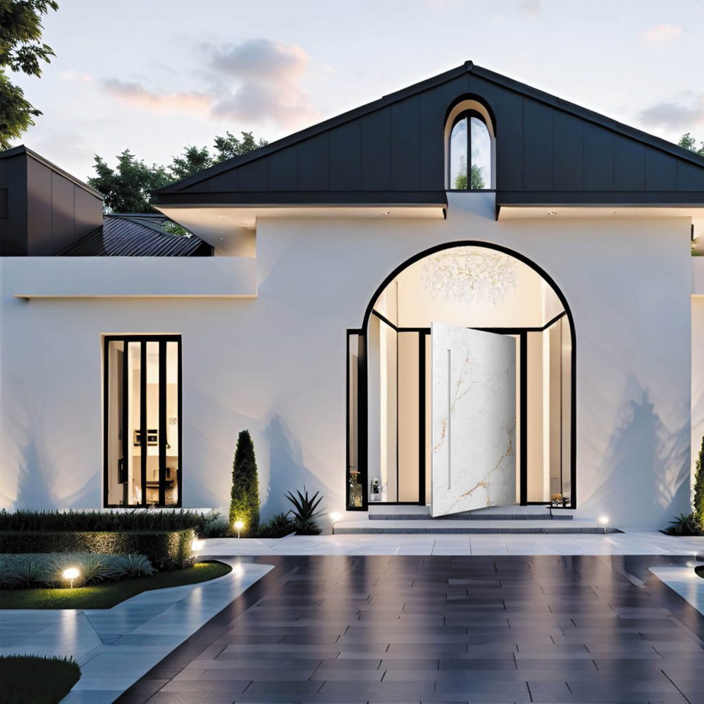 White marble pivot entry door in luxurious contemporary home with arched glass surround